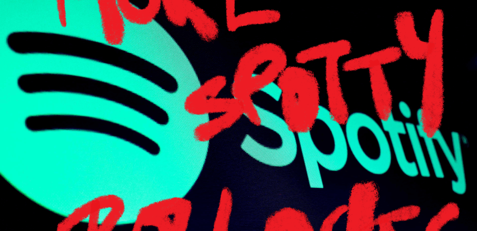 A screenshot of the Spotify logo with red handwritten script overlaid, reading "More spotty bollocks"